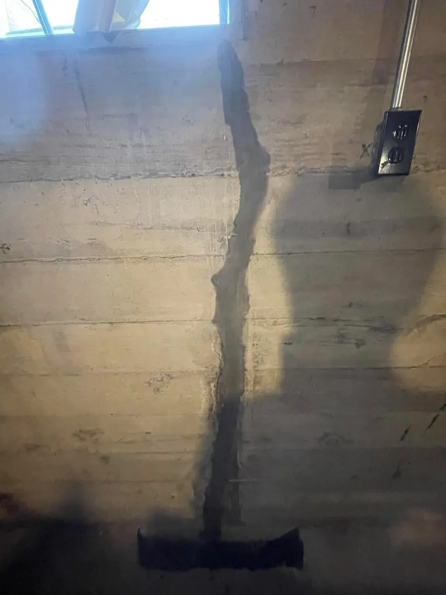Foundation wall crack before waterproofing repair